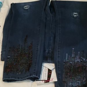 NWT jeans with sequin detail at bottom